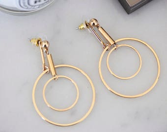 Gold-tone orbit earrings