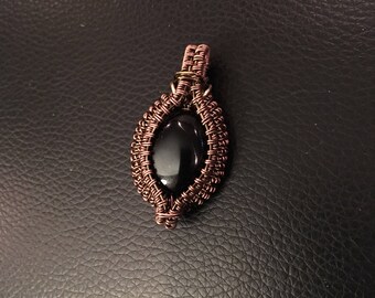 Jet wrapped in oxidized copper wire