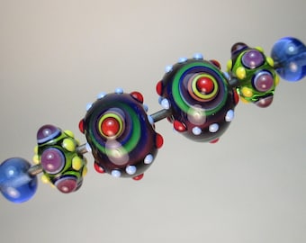 MATCHED PAIRS: BULLSEYE Focals + Fancy Minnies and Transparent Blue Plains Handmade Lampwork Beads by Patti Cahill (6 beads total)