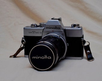 Minolta SRT MC II with Rokkor 135mm f3.5 telephoto lens - working film camera