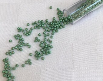 Size 11/0 Toho Metallic Permanent Finish Seed Beads. PF570F Metallic green frosted - approx 10g