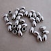 100 stainless steel beads 5mm x 4mm oval barrel