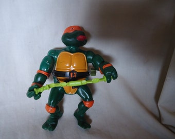 Vintage 1989 TMNT Teenage Mutant Ninja Turtles Michelangelo With Weapon Wacky Action Figure Toy by Mirage Studios, Playmate, collectable