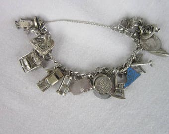 1960's Sterling Silver Charm Bracelet with 23 Sterling Charms Magnificent