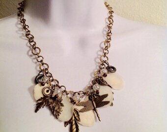 Statement necklace // dragonfly // shell charms // found object necklace // chunky necklace // bronze necklace