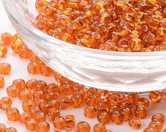 6/0 Clear Orange Silver Lined Seed Beads
