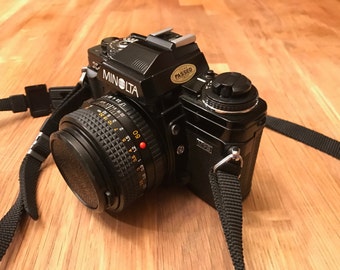 Minolta x-700 bundled with lenses and flash in like new condition