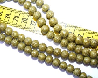 Speckled Dark Olivine 10 x 8mm Pearl round