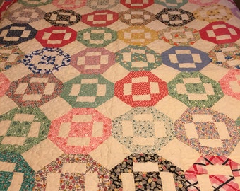 Vintage feed sack quilt top newly quilted