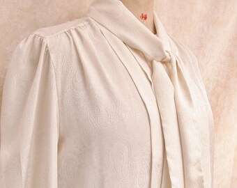 1980s off-white neck tie blouse / dress shirt / Made in Great Britain - paisley print / Sized medium / Polyester