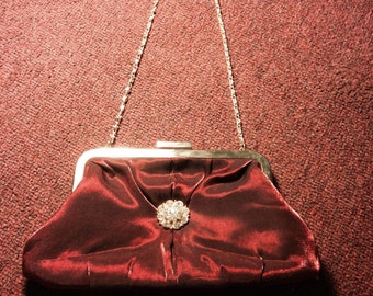 80's does 50's red satin evening bag with gold brooch and gold accents