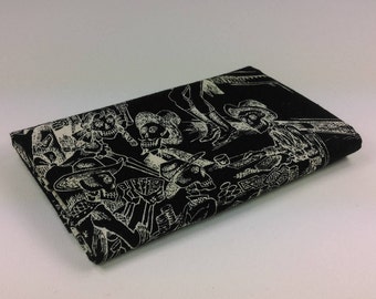 DEAD SALOON Coupon fabric cotton patchwork saloon scenes in ivory skeletons on black 50x55cm