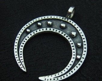 Silver lunula from medieval Poland