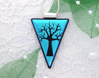 A lovely etched tree dichroic glass pendant