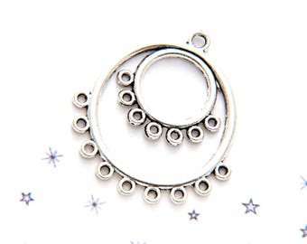 spacer between two silver coloured metal chandelierrond