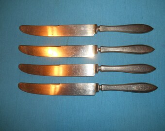 Four (4), 9 1/8", Gold Plated, Solid Dinner Knives, from Dirilyte (dirigold) in the Regal Pattern, 1937-1986.