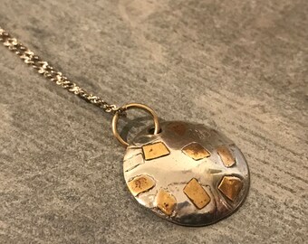 Stacked silver, gold circle domed necklace