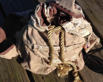 hand made lined shoulder bag with pockets and charms