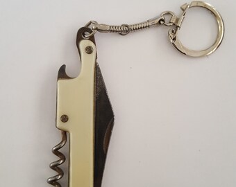 Vintage multi-tool keychain knife by Ideal, snake chain bottle opener, corkscrew and Jack knife, 1960's