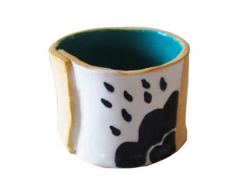 Handmade ceramic pot with clouds