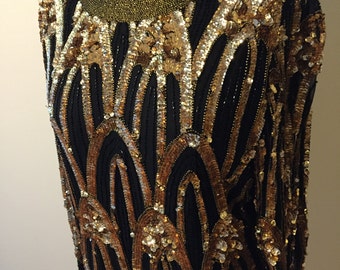 Party Staple. Black and Gold Sequin Top