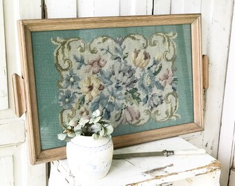 A beautiful needlepoint and oak glazed tray