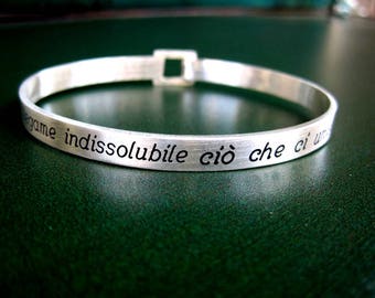 Rigid silver phrase bracelet
