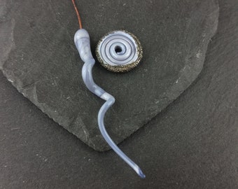 1 handmade lampwork glass headpin, and disc bead