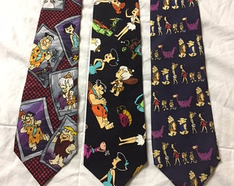 Bulk Flinstones ties. Bulk Flintstone ties. Bulk silk ties. Character ties. Flinstones ties. Vintage flintstone ties. Fred ties. Silk ties.