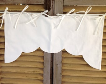 Door in old white cotton curtain