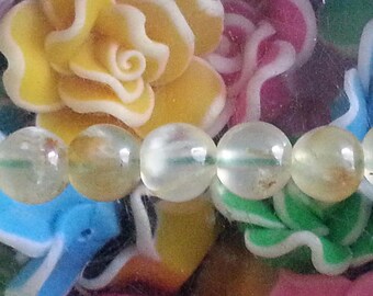 1 Pearl, prehnite 8mm in diameter, hole 1 mm