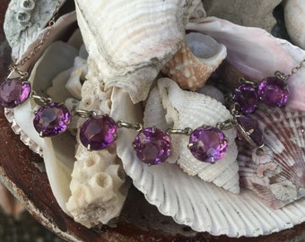 Vintage bezel set amethyst glass/paste chain necklace. 16 1/2 inches. Clasp marked sterling.(81)