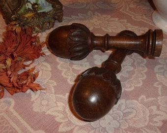 2 old carved wooden curtain rod brackets