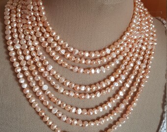 Pearl Necklace. 8 laps from major to minor. From the 64cm to the 42