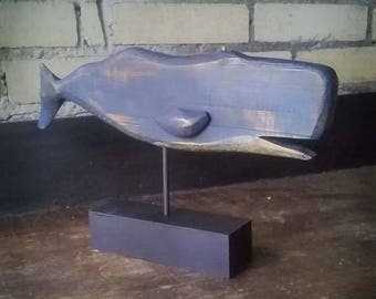Wood-carved whale for decoration