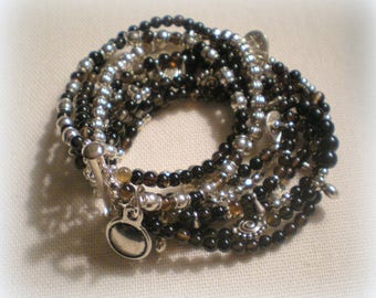 MULTI STRAND BRACELET ... black and silver