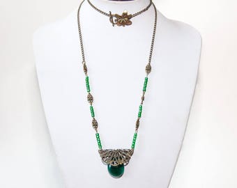 Necklace bronze chain and emerald green pendant