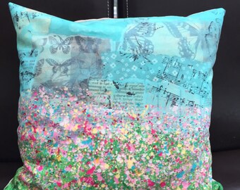 Splatter flower cushion