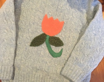 Upcycled recycled wool sweater with fleece flower embroidered and appliqued