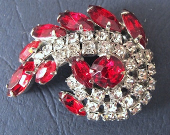 Wonderful 1940's red and clear diamente curled brooch