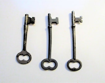 Vintage Skeleton Keys. 3 old rusty keys. Only 1 is marked, Corbin P8. All are 2.5" to 3" long. B