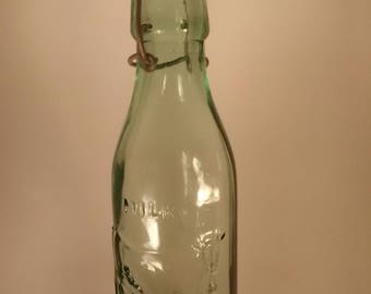 Recycled glass milk bottles made in Italy