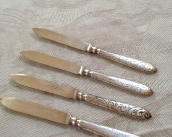 Vintage silver plate lamb chop knives