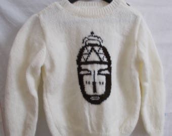 White pull off the African mask