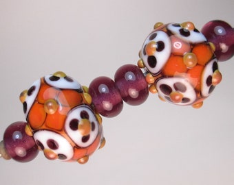MATCHED PAIRS OF Handmade Lampwork Beads by Patti Cahill, War-o'-the-Dots Florals, + 4 coordinating Amethyst Plains (6 beads total)