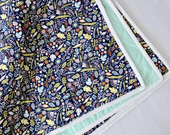 Whole cloth, crib-sized quilt