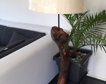 Floor lamp made of alluvial wood