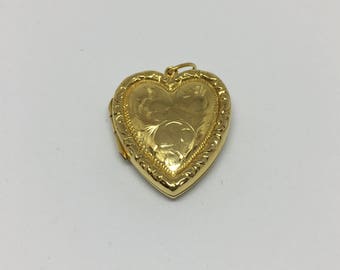 Vintage gold heart shaped locket
