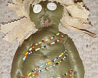 Olive, a primitive beaded art doll