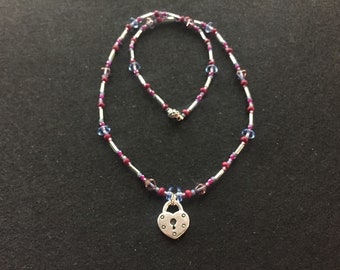 Purple and periwinkle bead necklace with heart lock charm